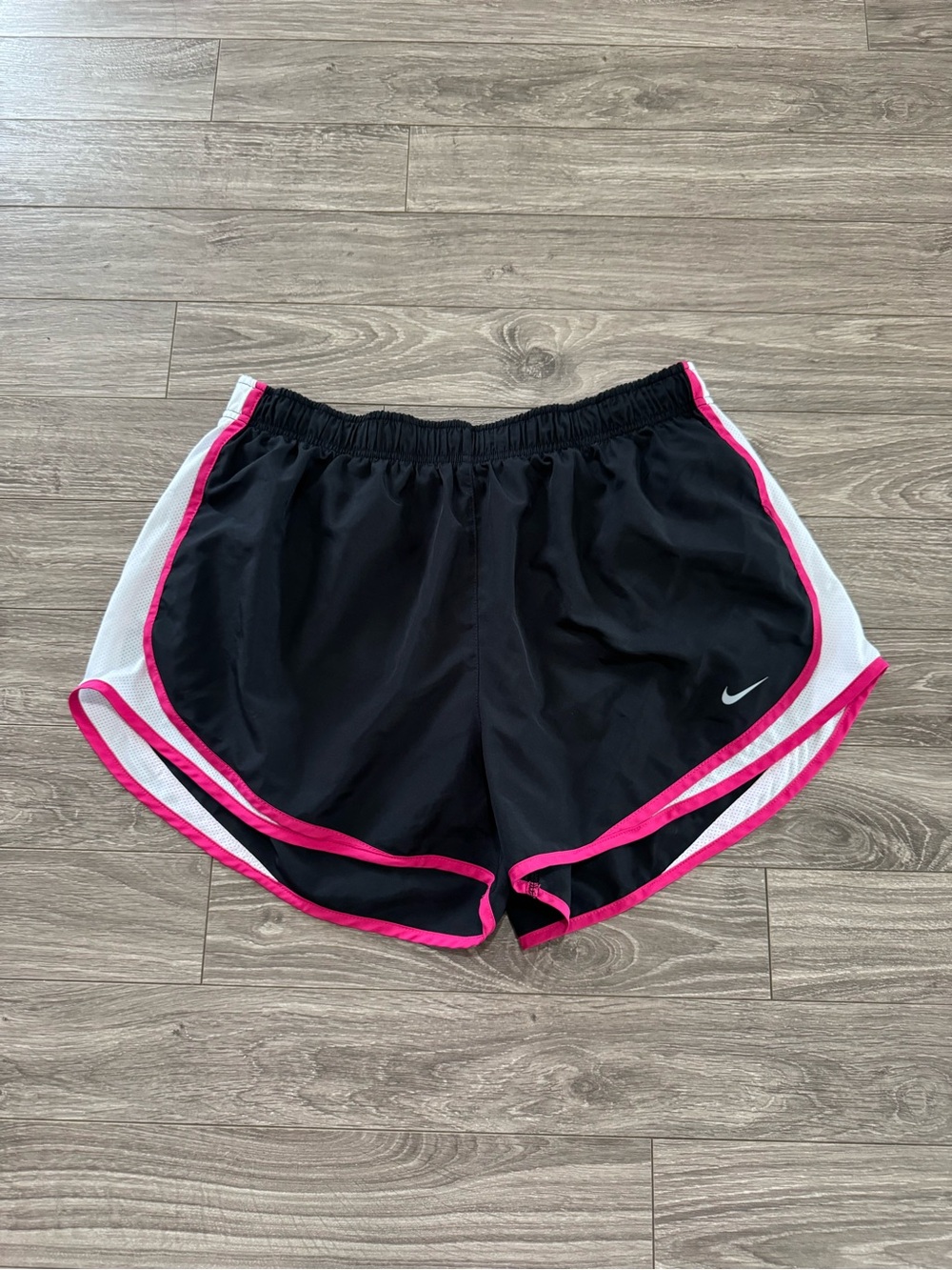 Nike Women's Black Athletic Shorts with Pink Trim and White Panels